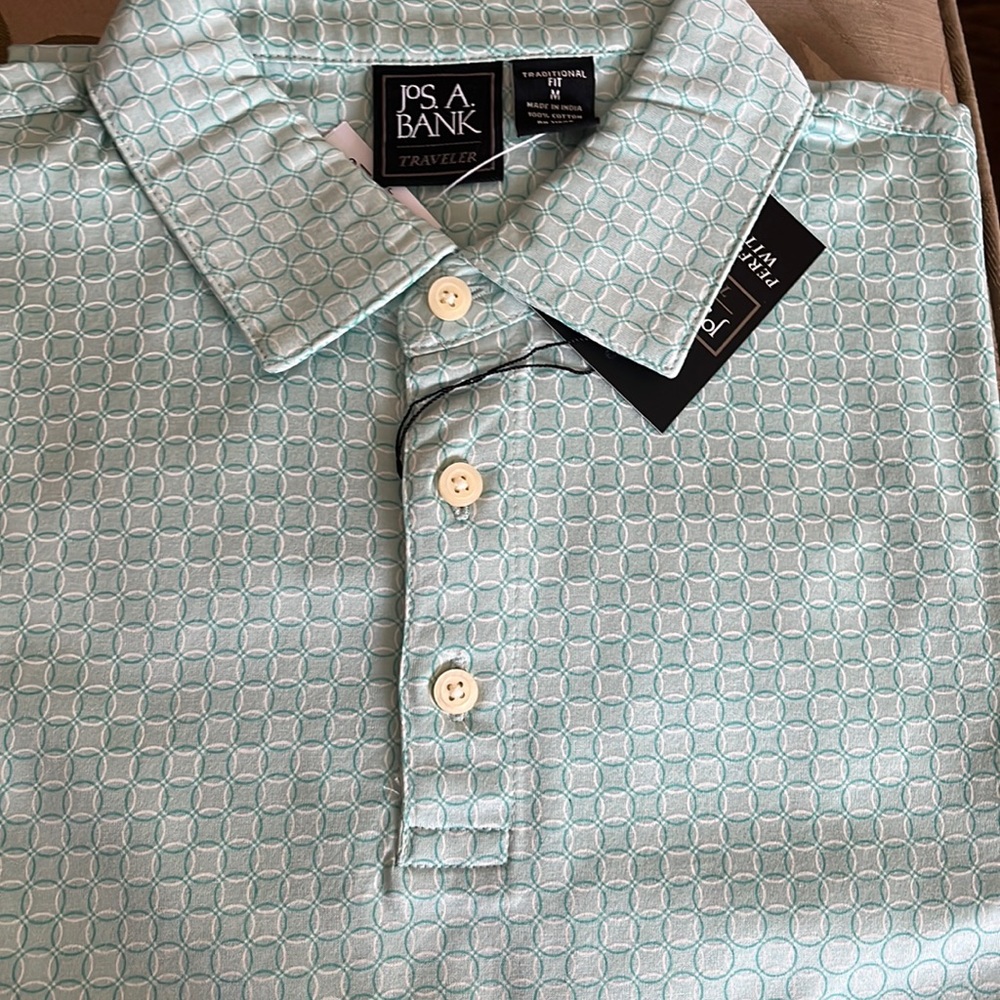 Brand new with tags short sleeve button down. Jos. A. Bank. Size M